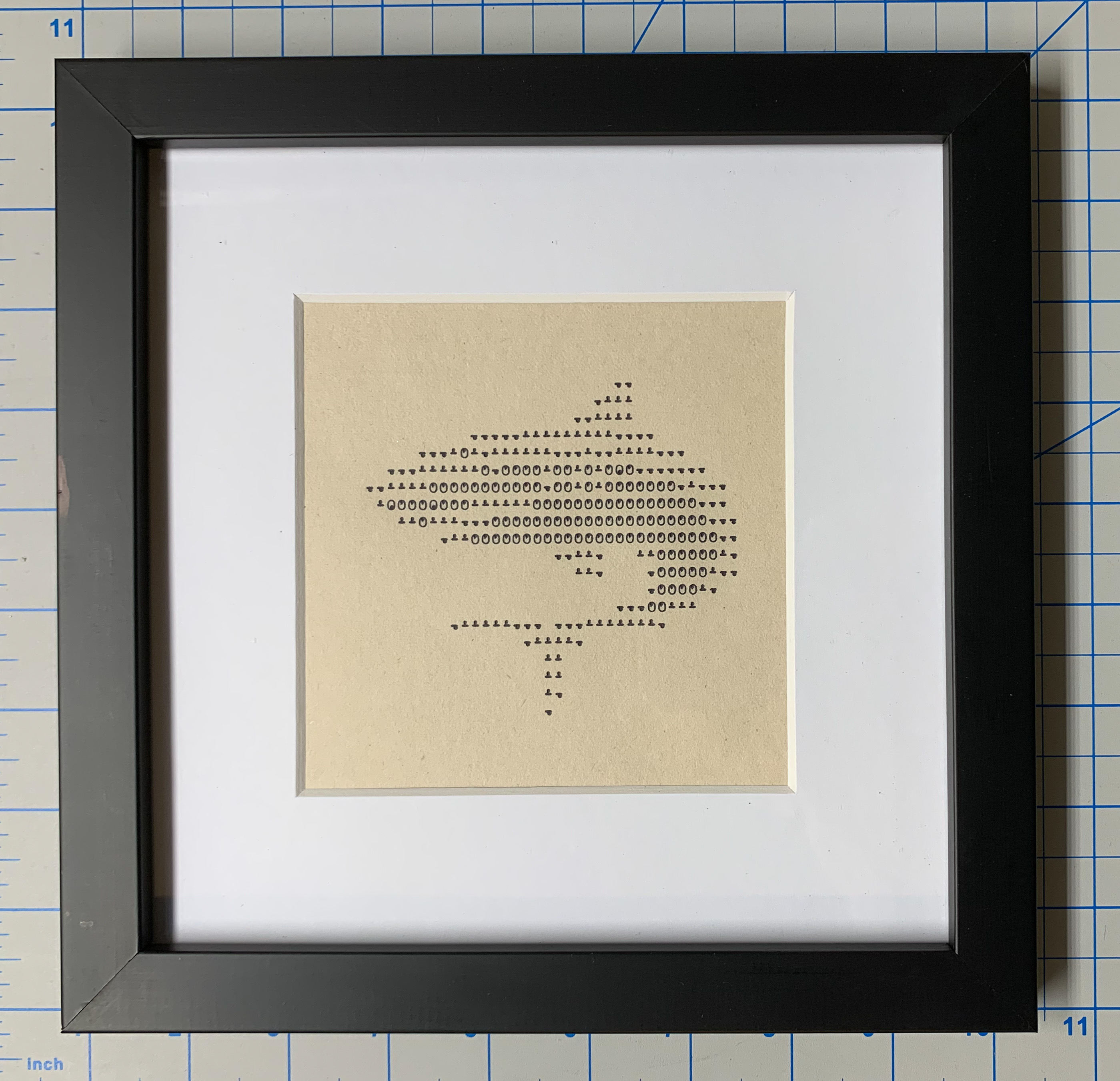 Shark emoji printed in overstrike on Teletype, framed